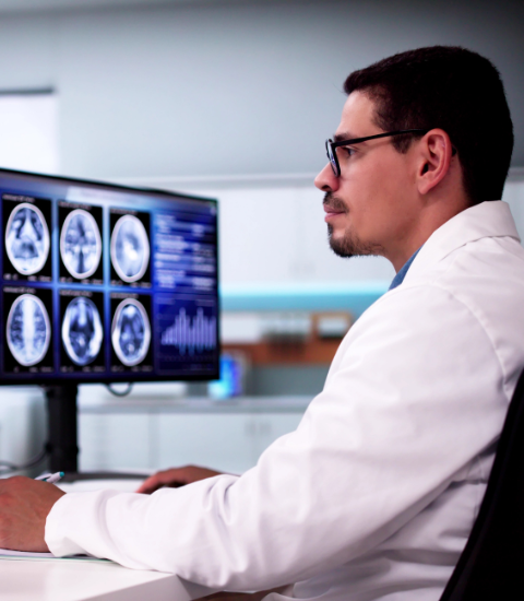 Doctor uses advanced document transmission to view patient scans.