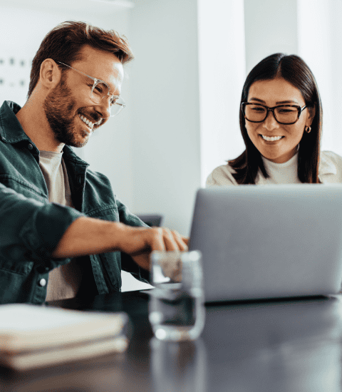 Man showing coworker how easy InterFAX for Salesforce is to use.