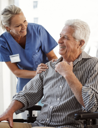 doctor with man in wheelchair