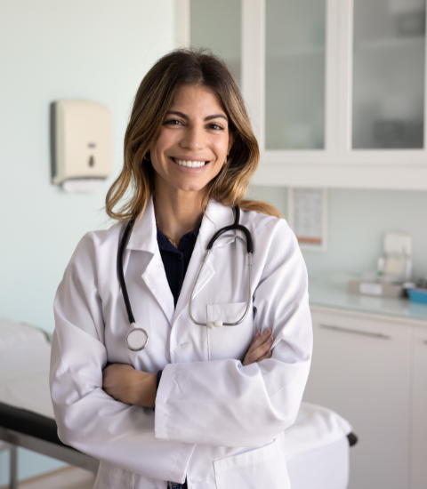 smiling doctor - referral leakage blog