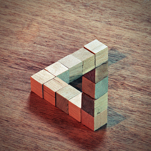 Penrose Triangle image with How to Build a Content Community for Content Marketeer