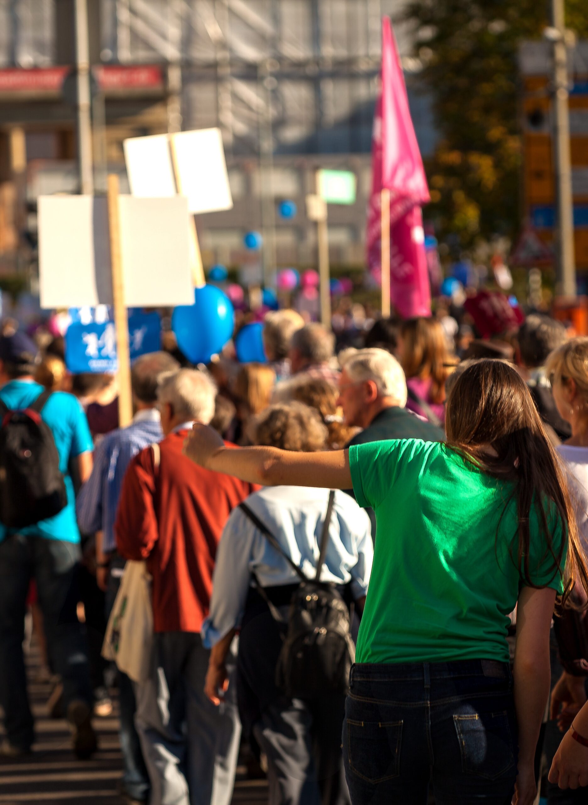 group of people protesting with signs