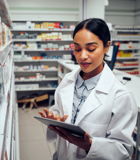Pharmacist uses ai cloud fax for healthcare on tablet