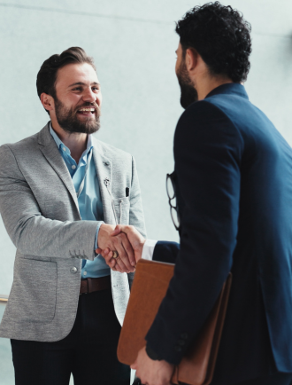 collegues shake hands